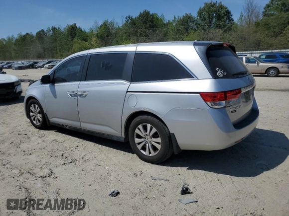 2015 Honda Odyssey EX-L with VIN 5FNRL5H66FB112090, listed as a Copart auction lot 52721475 with 120,472 mi miles and Salvage Title. Bid and sale history available at DreamBid. Image 2.