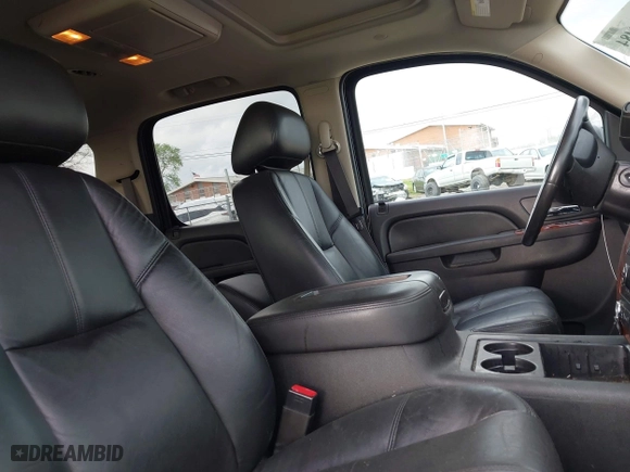 2013 Chevrolet Suburban LT with VIN 1GNSKJE70DR284785, listed as a IAAI auction lot 41838484 with 113,696 mi miles. Bid and sale history available at carsss.com. Image 5.