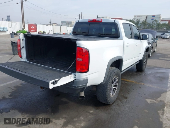2018 Chevrolet Colorado 4WD ZR2 with VIN 1GCPTEE19J1175475, listed as a IAAI auction lot 41473714 with 107,809 mi miles. Bid and sale history available at carsss.com. Image 4.