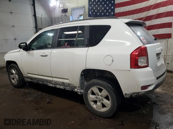 2013 Jeep Compass Sport with VIN 1C4NJCBA3DD102577, listed as a Copart auction lot 42816455 with 157,654 mi miles and Salvage Title. Bid and sale history available at carsss.com. Image 2.