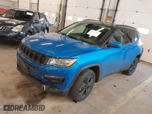 2019 Jeep Compass Latitude with VIN 3C4NJDBB7KT741048, listed as a IAAI auction lot 41597839 with 59,431 mi miles and . Bid and sale history available at DreamBid. Image 22.