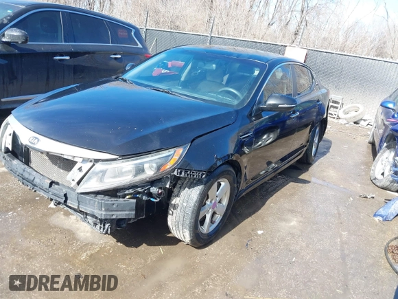 2015 Kia Optima LX with VIN KNAGM4A71F5652818, listed as a IAAI auction lot 41656933 with 251,967 mi miles. Bid and sale history available at carsss.com. Image 2.
