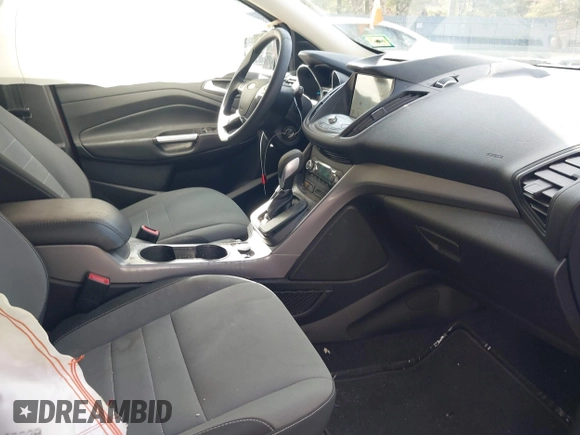 2016 Ford Escape SE with VIN 1FMCU9GX7GUC85187, listed as a IAAI auction lot 41678991 with 123,812 mi miles and . Bid and sale history available at DreamBid. Image 5.