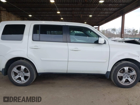 2014 Honda Pilot EX-L with VIN 5FNYF4H59EB047609, listed as a IAAI auction lot 42071353 with 148,661 mi miles and . Bid and sale history available at carsss.com. Image 12.