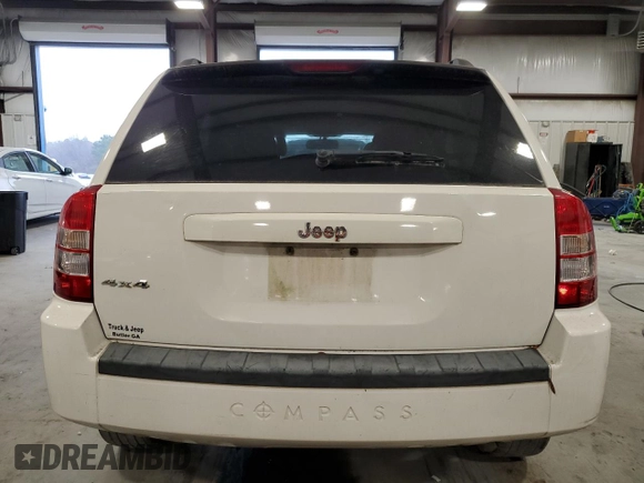 2007 Jeep Compass Sport with VIN 1J8FF47W17D188596, listed as a Copart auction lot 45799335 with 141,636 mi miles and Salvage Title. Bid and sale history available at carsss.com. Image 6.