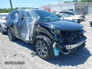 2020 Honda CR-V Touring with VIN 5J6RW2H97LL012504, listed as a IAAI auction lot 42332602 with 69,585 mi miles and . Bid and sale history available at DreamBid. Image 1.