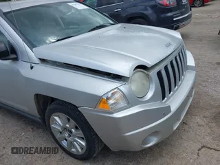 2007 Jeep Compass Sport with VIN 1J8FF47W97D279230, listed as a IAAI auction lot 42207379 with 205,058 mi miles and . Bid and sale history available at carsss.com. Image 6.
