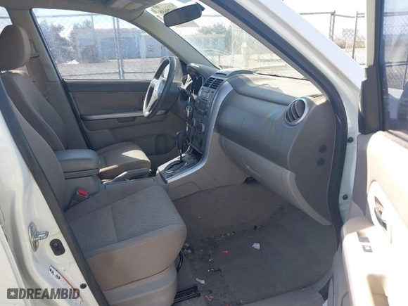 2010 Suzuki Grand Vitara Premium with VIN JS3TE0D21A4110383, listed as a IAAI auction lot 41878698 with 143,925 mi miles. Bid and sale history available at carsss.com. Image 5.