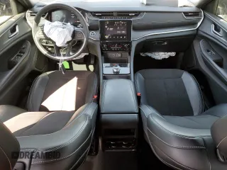 2024 Jeep Grand Cherokee Altitude with VIN 1C4RJHAG3R8939561, listed as a Copart auction lot 56419615 with 9,383 mi miles and Salvage title. Bid and sale history available at DreamBid. Image 8.