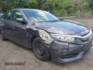 2017 Honda Civic LX z VIN 19XFC2F52HE053026, wystawiony jako IAAI lot #42324075 z przebiegiem 36 528 mil mil oraz . Historia ofert i sprzedaży dostępna na DreamBid. Obrazek 1.