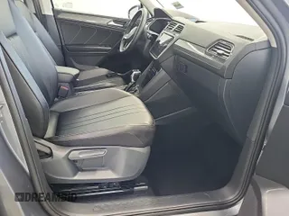 2024 Volkswagen Tiguan SE with VIN 3VV3B7AX1RM108036, listed as a IAAI auction lot 42796415 with 37,805 mi miles and . Bid and sale history available at DreamBid. Image 23.
