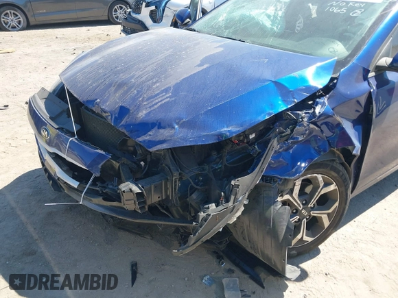 2019 Kia Forte LXS with VIN 3KPF24AD2KE061065, listed as a IAAI auction lot 41887404 with 77,628 mi miles and . Bid and sale history available at DreamBid. Image 6.
