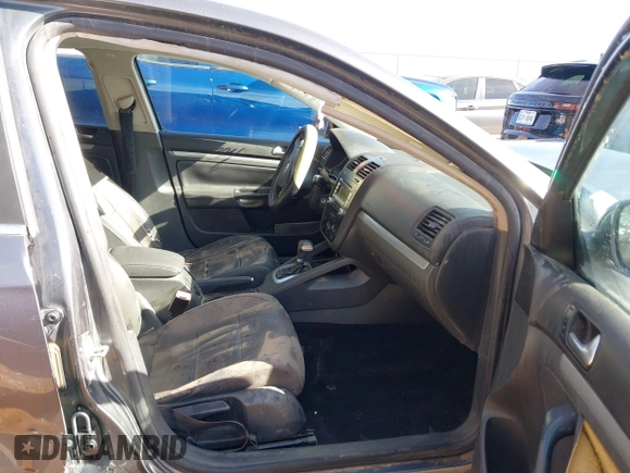 2007 Volkswagen Jetta 2.5 z VIN 3VWRF71K37M101410, wystawiony jako IAAI lot #41863276 z przebiegiem 195 616 mil mil oraz . Historia ofert i sprzedaży dostępna na DreamBid. Obrazek 5.
