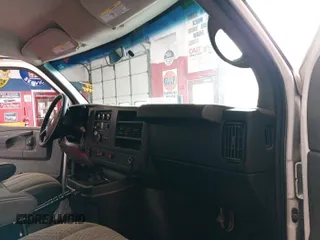 2014 Chevrolet Express Cargo Van with VIN 1GCWGFCA6E1197965, listed as a IAAI auction lot 42186151 with 199,293 mi miles. Bid and sale history available at carsss.com. Image 1.