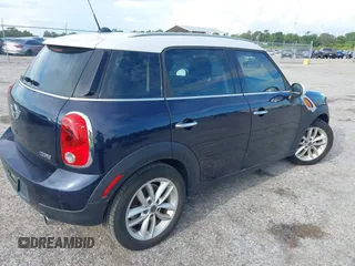 2013 MINI Countryman with VIN WMWZB3C5XDWM31035, listed as a IAAI auction lot 42543943 with 151,209 mi miles and . Bid and sale history available at DreamBid. Image 4.