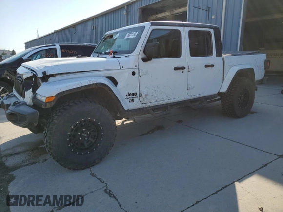 2021 Jeep Gladiator Willys with VIN 1C6HJTAGXML623599, listed as a Copart auction lot 48971735 with 35,052 mi miles and Salvage Title. Bid and sale history available at carsss.com. Image 1.