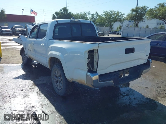 2017 Toyota Tacoma SR5 with VIN 5TFAZ5CNXHX044976, listed as a IAAI auction lot 42052922 with 149,116 mi miles and . Bid and sale history available at DreamBid. Image 3.