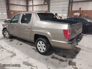 2011 Honda Ridgeline RTS with VIN 5FPYK1F4XBB008020, listed as a IAAI auction lot 41817310 with 227,803 mi miles. Bid and sale history available at carsss.com. Image 3.