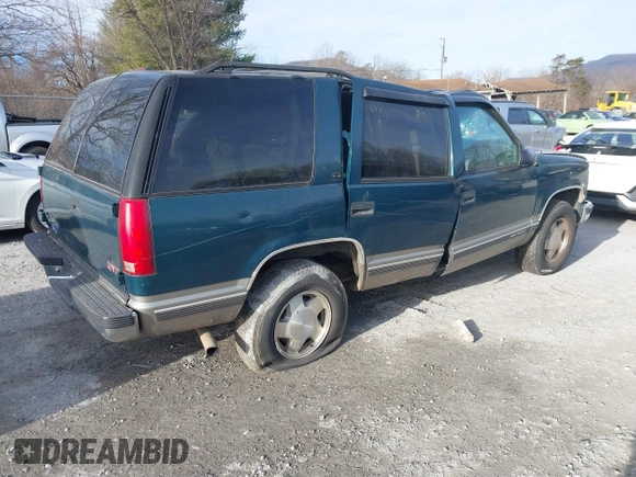 1998 GMC Yukon z VIN 1GKEK13R2WJ731178, wystawiony jako IAAI lot #41339082 z przebiegiem 291 604 mil mil oraz . Historia ofert i sprzedaży dostępna na DreamBid. Obrazek 4.