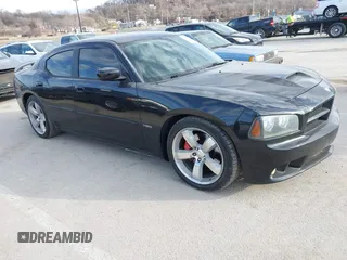 2006 Dodge Charger SRT-8 with VIN 2B3LA73W96H371246, listed as a IAAI auction lot 41676168 with 130,064 mi miles and . Bid and sale history available at carsss.com. Image 1.