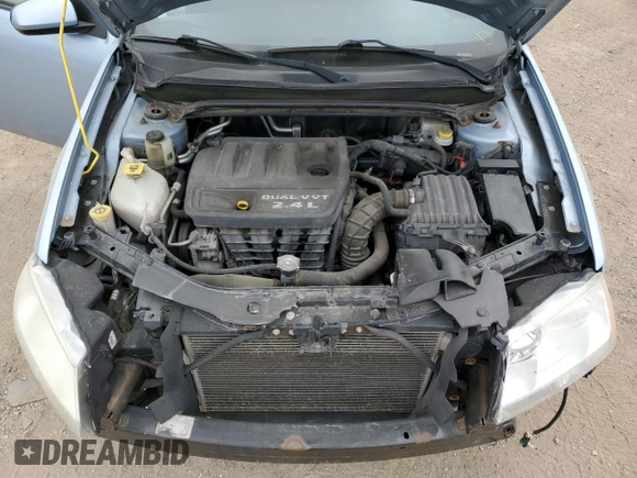 2013 Dodge Avenger SXT with VIN 1C3CDZCB9DN572815, listed as a Copart auction lot 54916285 with 123,010 mi miles and Salvage title. Bid and sale history available at DreamBid. Image 11.