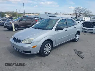 2007 Ford Focus S with VIN 1FAFP34N37W309603, listed as a IAAI auction lot 42050142 with 87,371 mi miles and . Bid and sale history available at carsss.com. Image 2.