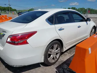 2013 Nissan Altima SV with VIN 1N4BL3AP5DC911951, listed as a IAAI auction lot 42176925 with 172,587 mi miles and . Bid and sale history available at DreamBid. Image 4.
