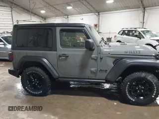 2021 Jeep Wrangler Sport S with VIN 1C4GJXAN7MW647786, listed as a IAAI auction lot 41685775 with 31,907 mi miles and . Bid and sale history available at DreamBid. Image 13.