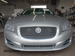 2013 Jaguar XJ Portfolio with VIN SAJWJ2GD0D8V50948, listed as a IAAI auction lot 42067884 with 110,053 mi miles and . Bid and sale history available at DreamBid. Image 6.