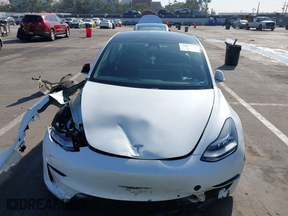 2019 Tesla Model 3 Long Range with VIN 5YJ3E1EB1KF510912, listed as a IAAI auction lot 41857775 with Not Provided miles and . Bid and sale history available at DreamBid. Image 12.