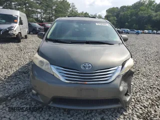 2011 Toyota Sienna XLE AAS with VIN 5TDYK3DC5BS094699, listed as a Copart auction lot 61583905 with 245,035 mi miles and Salvage title. Bid and sale history available at DreamBid. Image 5.