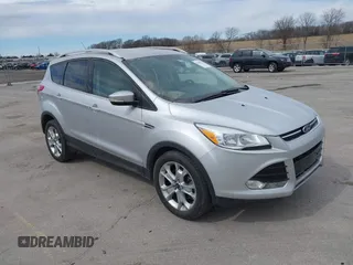 2014 Ford Escape Titanium with VIN 1FMCU9J92EUD59994, listed as a IAAI auction lot 41859021 with 122,748 mi miles. Bid and sale history available at carsss.com. Image 1.