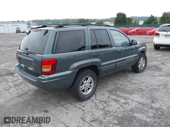 2004 Jeep Grand Cherokee Laredo with VIN 1J4GW48S24C276284, listed as a IAAI auction lot 42596655 with 142,524 mi miles and . Bid and sale history available at DreamBid. Image 4.