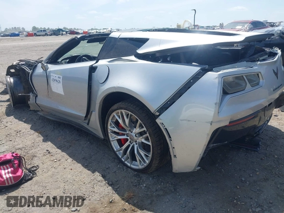 2015 Chevrolet Corvette Z06 2LZ z VIN 1G1YS2D64F5605330, wystawiony jako IAAI lot #42059620 z przebiegiem Nie podano mil oraz . Historia ofert i sprzedaży dostępna na DreamBid. Obrazek 3.