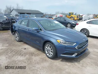 2018 Ford Fusion Energi SE with VIN 3FA6P0PU0JR196091, listed as a IAAI auction lot 42017867 with 70,284 mi miles. Bid and sale history available at carsss.com. Image 1.