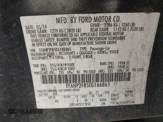 2014 Ford Taurus Limited с VIN 1FAHP2F85EG166865, выставлен на аукционе IAAI как лот 42409062 с пробегом 224 882 миль миль и . История ставок и продаж доступна на DreamBid. Изображение 9.