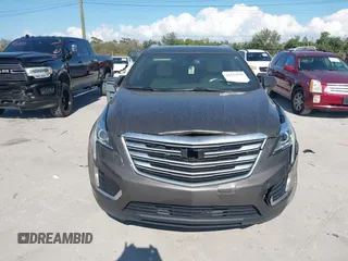 2019 Cadillac XT5 FWD with VIN 1GYKNARS5KZ143510, listed as a IAAI auction lot 41553279 with 53,943 mi miles and . Bid and sale history available at carsss.com. Image 12.
