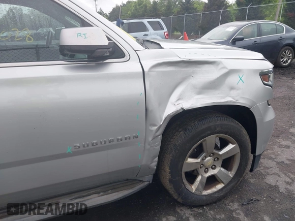 2015 Chevrolet Suburban LT z VIN 1GNSCJKC2FR144528, wystawiony jako IAAI lot #42320028 z przebiegiem 226 076 mil mil oraz . Historia ofert i sprzedaży dostępna na DreamBid. Obrazek 6.