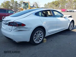 2016 Tesla Model S 90D with VIN 5YJSA1E26GF147327, listed as a IAAI auction lot 42077766 with 89,502 mi miles and . Bid and sale history available at DreamBid. Image 4.