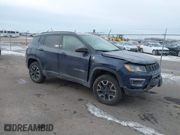 2020 Jeep Compass Trailhawk with VIN 3C4NJDDB3LT143926, listed as a IAAI auction lot 41368613 with 61,909 mi miles and . Bid and sale history available at carsss.com. Image 1.