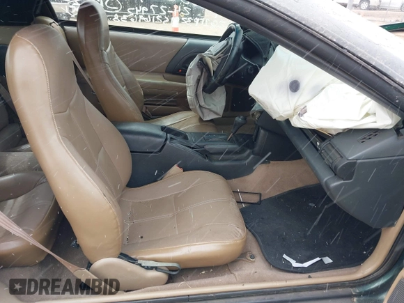 1995 Chevrolet Camaro Z28 z VIN 2G1FP32P9S2169638, wystawiony jako IAAI lot #39049392 z przebiegiem 115 543 mil mil oraz . Historia ofert i sprzedaży dostępna na DreamBid. Obrazek 5.