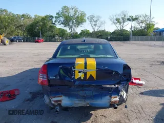 2005 Chrysler 300 300C AWD z VIN 2C3AK63H05H672425, wystawiony jako IAAI lot #42224241 z przebiegiem 143 185 mil mil oraz . Historia ofert i sprzedaży dostępna na DreamBid. Obrazek 6.