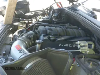 2014 Jeep Grand Cherokee SRT-8 z VIN 1C4RJFDJ7EC159369, wystawiony jako IAAI lot #41997249 z przebiegiem 166 493 mil mil oraz . Historia ofert i sprzedaży dostępna na DreamBid. Obrazek 19.