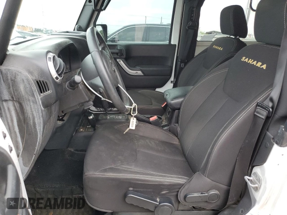 2013 Jeep Wrangler Sahara with VIN 1C4AJWBGXDL579341, listed as a Copart auction lot 55970815 with 105,961 mi miles and Salvage title. Bid and sale history available at DreamBid. Image 7.
