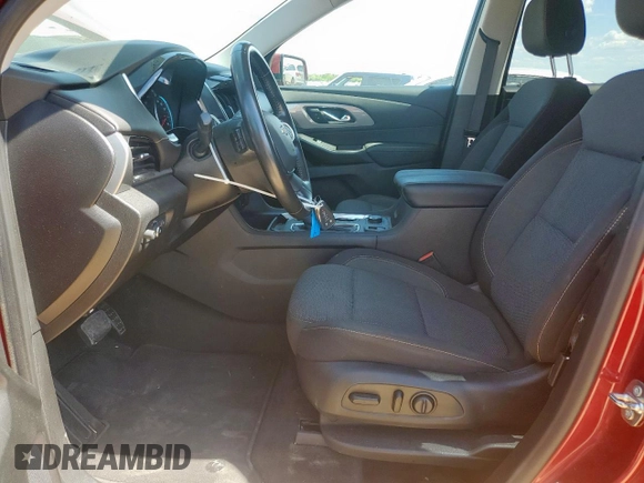 2020 Chevrolet Traverse LT Cloth with VIN 1GNERGKW6LJ289378, listed as a Copart auction lot 63247035 with 100,394 mi miles and Salvage title. Bid and sale history available at DreamBid. Image 7.