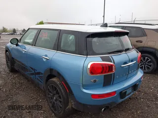 2017 MINI Clubman Cooper z VIN WMWLN5C56H2E32370, wystawiony jako IAAI lot #42159911 z przebiegiem 134 375 mil mil oraz . Historia ofert i sprzedaży dostępna na DreamBid. Obrazek 3.