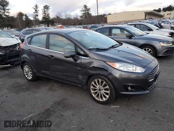 2017 Ford Fiesta Titanium with VIN 3FADP4FJ3HM109507, listed as a Copart auction lot 87182664 with 105,198 mi miles and Salvage Title. Bid and sale history available at DreamBid. Image 4.