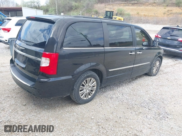 2015 Chrysler Town & Country Touring L with VIN 2C4RC1CG8FR522404, listed as a IAAI auction lot 41932426 with 165,092 mi miles and . Bid and sale history available at DreamBid. Image 4.
