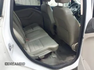 2014 Ford Escape SE with VIN 1FMCU9G99EUC15477, listed as a IAAI auction lot 42147162 with 98,886 mi miles and . Bid and sale history available at DreamBid. Image 8.