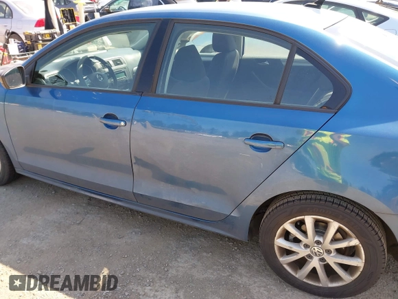 2015 Volkswagen Jetta Sedan 1.8T SE with VIN 3VWD17AJ1FM270114, listed as a IAAI auction lot 42128816 with 111,701 mi miles. Bid and sale history available at carsss.com. Image 6.